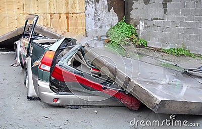Car Crushed in Earthquake. Stock Photo