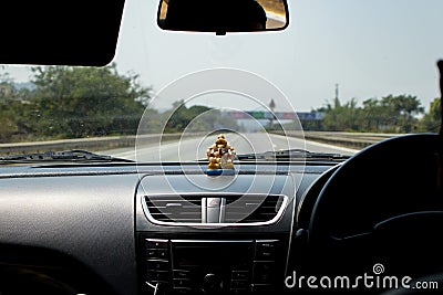 Car dashboard with empty expressway look through car windshield Stock Photo