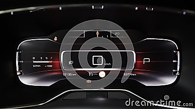 Car dashboard panel with speedometer, tachometer, odometer, fuel gauge and gear position indicator. Stock Photo