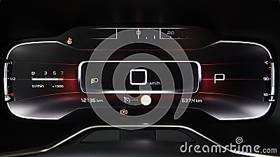 Car dashboard panel with speedometer, tachometer, odometer, fuel gauge and gear position indicator. Stock Photo