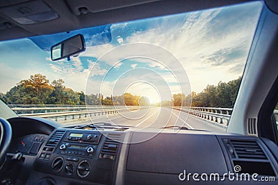 Car dashboard and steering wheel inside of car Stock Photo