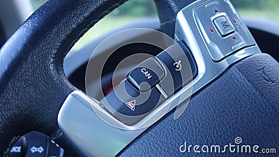 Car detail, cruise control switch, tempomat, speed limitation button, modern car, Stock Photo