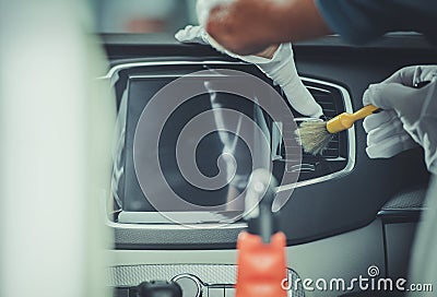 Car Detailing Service Worker Cleaning Vehicle Dashboard Stock Photo