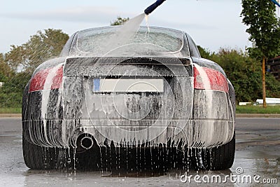 Car Washing with Foam Shampoo. Stock Photo