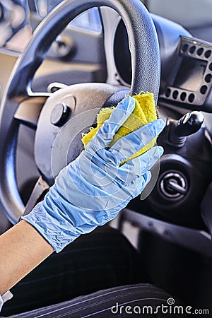 Car disinfecting service. Cleansing car interior and spraying with disinfection liquid Stock Photo
