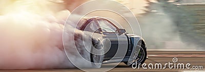 Car drifting, Blurred image diffusion race drift car with lots of smoke from burning tires on speed track Stock Photo