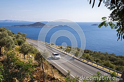 Car driving along the Mediterranean coast in southern Turkey Stock Photo
