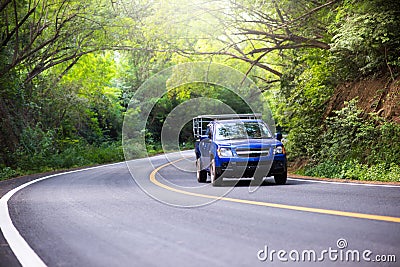 Car is driving through the curve. Stock Photo