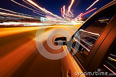 Car driving fast Stock Photo