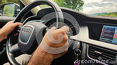 Car driving, hands on steering wheel Editorial Stock Photo