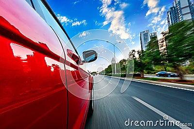 A car driving on a motorway at high speeds Stock Photo