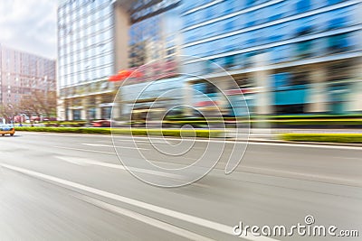 Car driving on road, motion blur Stock Photo