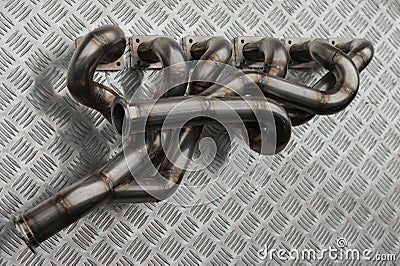 Car engine exhaust manifold stainless steel Stock Photo