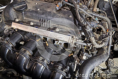 Car engine, intake manifold, connection of LPG injectors Stock Photo