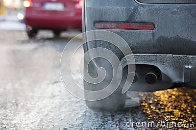Car exhaust pipe, which comes out strongly exhaust gases in Finland. Stock Photo
