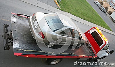 Car on a flatbed truck Stock Photo