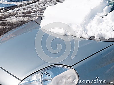 Car frontal window covered fresh snow Stock Photo