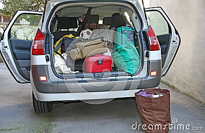 Car full of luggage before departure Stock Photo