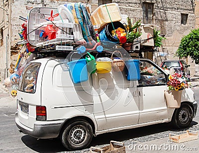 The car is fully loaded with luggage. Sicily Editorial Stock Photo