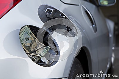 car, gas cap and money Stock Photo