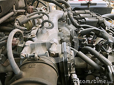 Car gasoline engine photo. Car engine part. Close-up image, internal combustion engine, used car, Stock Photo