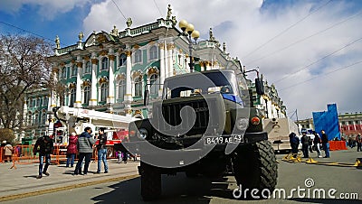 Car GAZ against the building of the Hermitage Museum in St. Petersburg during the celebration of the Victory parade Editorial Stock Photo