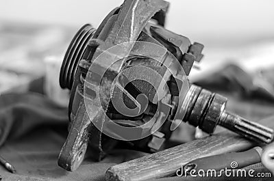 Car generator rotor on a workbench closeup Stock Photo
