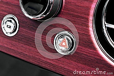 Car hazard warning flashers and emergency button with visible red triangle. Selective focus. Automotive part concept. Emergency st Stock Photo