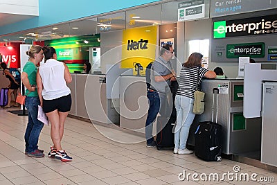 Car hire counters at airport Editorial Stock Photo
