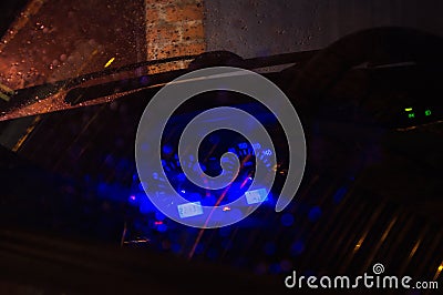 Car inside gray seats red dashboard night photography in the dark Stock Photo