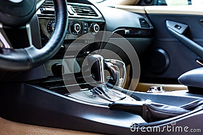 Car interior. Modern car speedometer and dashboard. Luxurious car instrument cluster. Stock Photo