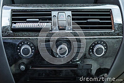 Car interior. Modern car speedometer and dashboard. Luxurious car instrument cluster. Stock Photo