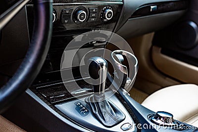 Car interior. Modern car speedometer and dashboard. Luxurious car instrument cluster. Stock Photo