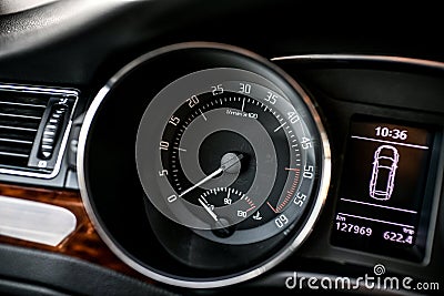 Car interior, New Car Dashboard Car gear shifter Car panel instrument speedometer and tachometer Stock Photo