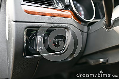 Car interior, New Car Dashboard Car gear shifter Car panel instrument speedometer and tachometer Stock Photo