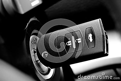 Car key into ignition lock Stock Photo