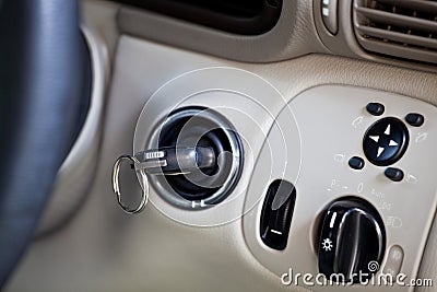Car key in ignition lock cylinder Stock Photo