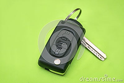 Car key isolated on green. close up Stock Photo