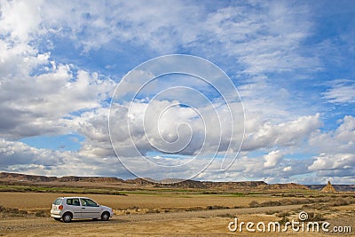 Car in the lonely road Stock Photo