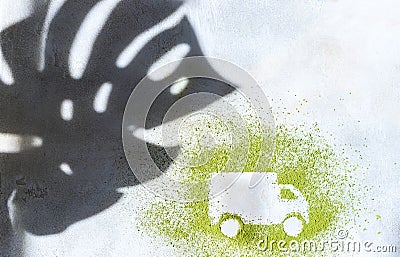 A car made of green powder and the shadow of plants on a light background. Online shopping. Delivery service concept, logistics, Stock Photo