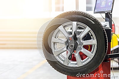 Car maintenance and service center. Vehicle tire repair and replacement equipment. Seasonal tire change Stock Photo