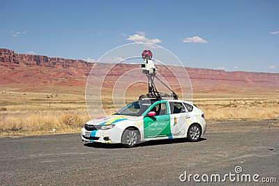 A car mapping a road in the desert as seen parked at the vermillion cliffs Editorial Stock Photo