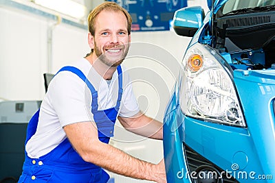 Car mechanic and auto in service workshop Stock Photo