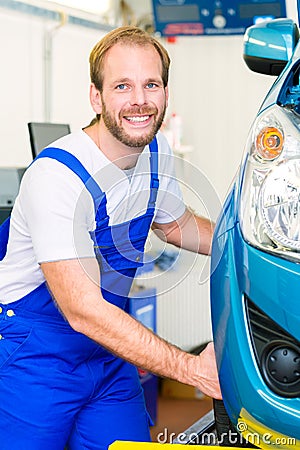 Car mechanic and auto in service workshop Stock Photo