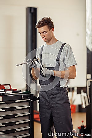 A car mechanic is focused on his work Stock Photo