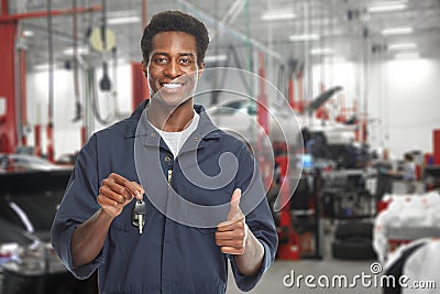 Car mechanic in garage. Stock Photo