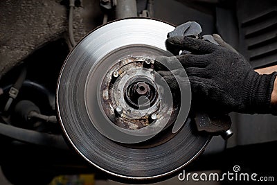 Car mechanic repair brake pads Stock Photo