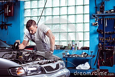 Car mechanic at work Stock Photo