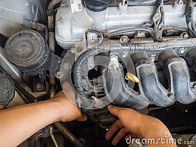 Car mechanic working in auto repair service Stock Photo