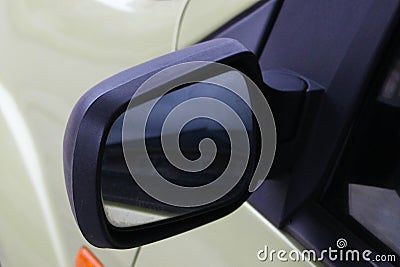 Car mirror. Black auto mirror. Rearview car driving mirror view house. Stock Photo